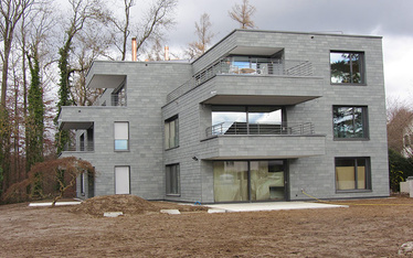 <strong>Fassadenbau</strong> Küsnacht <br />Naturschieferfassade, Spengerarbeiten